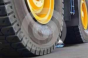 The protector of a large rubber wheel. Huge rubber tire career dump trucks, mining trucks from the tipper