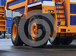 The protector of a large rubber wheel. Huge rubber tire career dump trucks, mining trucks from the tipper