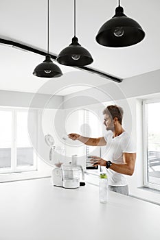 Protein Shake. Man Preparing Sports Drink Before Workout.