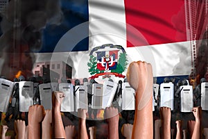 Protest in Dominican Republic - police swat stand against the demonstrators crowd on flag background, revolt stopping concept,