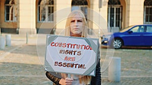 Protest walk: woman advocating for constitutional rights protection