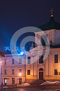 Protestant church in Banska Stiavnica town during winter evening