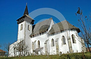 Protestant church in Sintereag (Somkerek). Transylvania, Romania photo