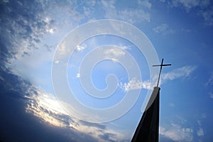 Protestant church top cross in the sky photo