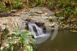 Protester falls waterfall