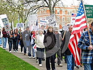 Protester on Government over spending.