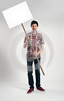 Protesting man with placard photo