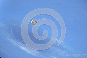 Proteus orbiting around Neptune planet. 3d render