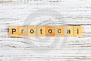 PROTOCOL word made with wooden blocks concept photo