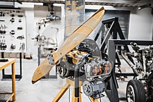 Prototype of aircraft turbo prop engine displayed in aircraft maintenance classroom for studying.