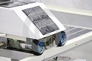 Prototype of a small mechanical rover that in run on wheels attached to a dc motor and powered by sun using multiple solar panels