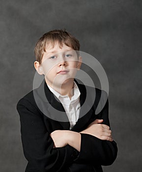 Proud boy on grey background