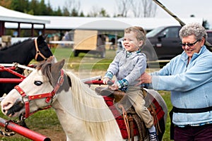 Proud Boy on his First Pony Ride
