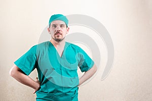 A proud doctor in a cap and a mask.