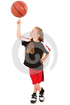 Proud Girl Child Spinning Basketball on Finger