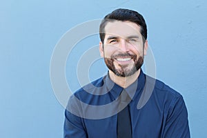 Proud Italian Businessman smiling in front of his office. He is a successful man with a lot of leadership