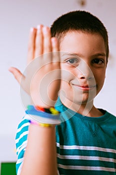 Proud kid wearing bracelets