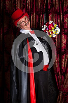 Proud magician with flowers