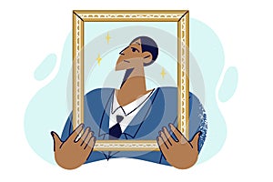 Proud man in business clothes holding golden portrait frame, for concept of narcissism