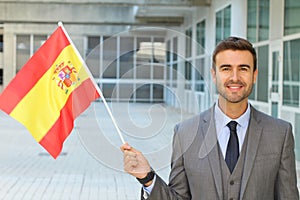 Proud man waving the Spanish flag