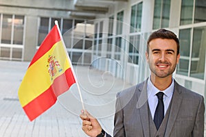 Proud man waving the Spanish flag