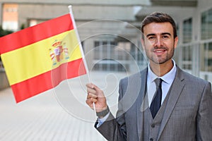 Proud man waving the Spanish flag