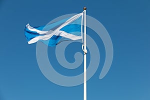 Proud Scottish flag flapping in the wind