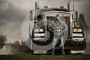 Proud Semi Truck Owner in Front of His Commercial Vehicle