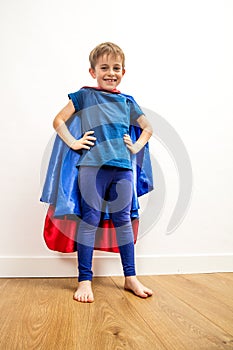 Proud super hero kid staring for power and body language