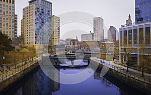 Providence Downtown Waterplace Park with City Skyline and Reflections on the River photo