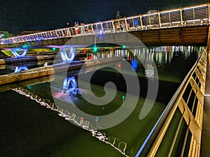 Providence Rhode Island Walkway across Woonasquatucket River at night photo