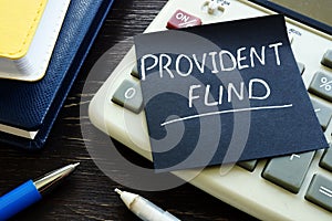 Provident fund memo sign on the calculator. photo