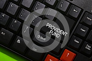 Provident Fund write on keyboard isolated on laptop background photo