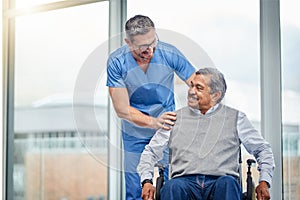 Providing comfort and care when he needs it most. a nurse helping a senior man in a wheelchair.