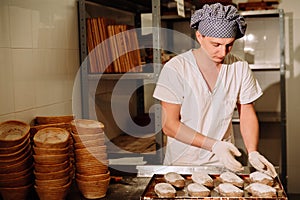 Proving dough of bran in basket. Private Bakery. Production bread.