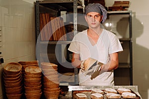 Proving dough of bran in basket. Private Bakery. Production bread.