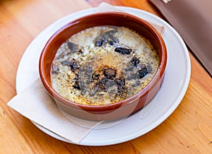 Provolone cheese baked with mushrooms seasoned with Italian herbs