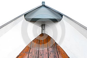 The prow of a plastic boat viewed from the inside with a wooden floor, isolated on a white background with a clipping path.