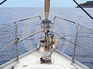Prow of a sailboat navigating in the mediterranean sea