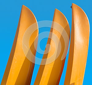 Prows or front of three plastic kayaks or canoes photo