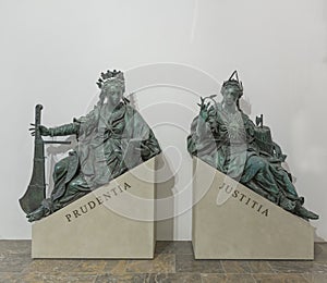 Prudentia and Justitia bronze sculptures photo