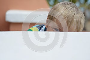 Prying boy photo