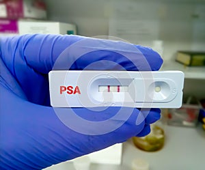 PSA (Prostate Specific Antigen) with a positive result. Rapid test cassette