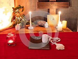 psalter, candles and rosary in monastery