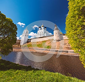 Pskov church and kremlin with blue cloudy sky