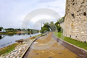 Pskov, the embankment of the Great river near the Pokrovsky fortress tower