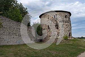 Pskov, Mikhailovskaya fortress tower and a fragment of the wall of the Roundabout city, an interesting tourist place