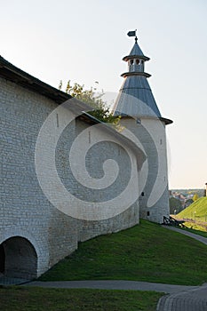 Pskov, Russia, September 11, 2023. A high Kremlin watchtower and a fragment of a wall.