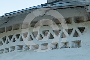 Pskov, Russia, September 6, 2023. A characteristic stone pattern on the wall of an old Russian church.