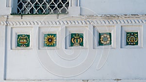 Pskov, Russia, September 6, 2024. Traditional Russian tiles on the wall of the Trinity Cathedral.